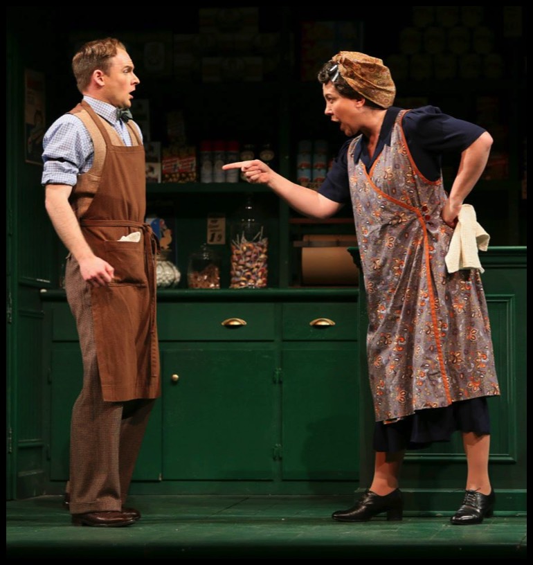 Lawrence with Rebecca Hass as Mrs. Herring